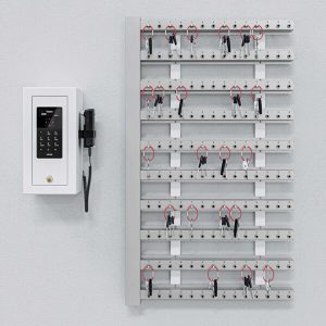 Creone keyrack system with electronic keypad unit and multiple tagged key slots for secure wall-mounted key management.